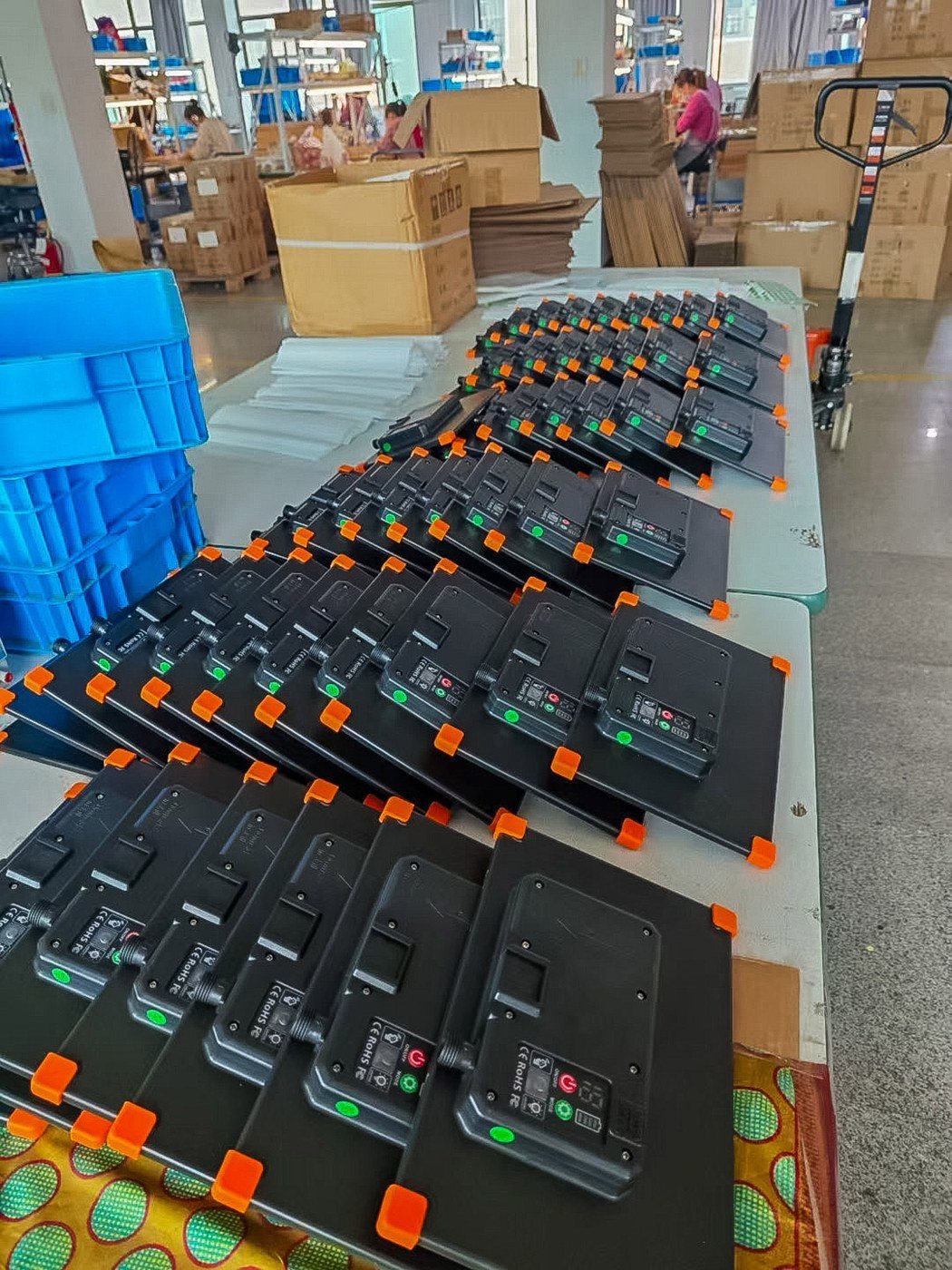 Solar control boxes arranged on a workbench in supplied production photograph